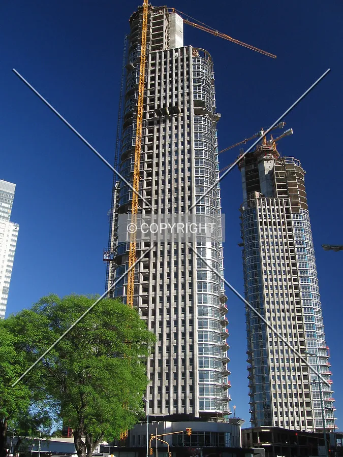 View from the north, at right the south tower of the same complex