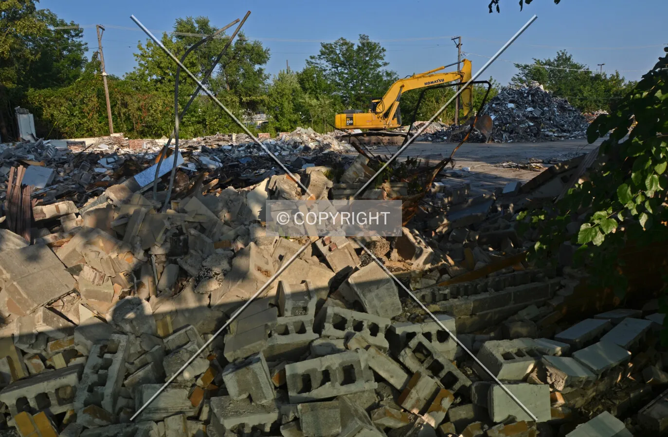 Northwest corner of the building and remains of the front facade during demolition. August 25, 2013.