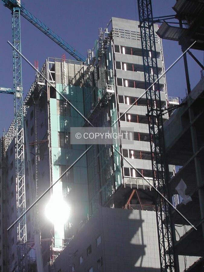 View of the top of the building with some glass facade