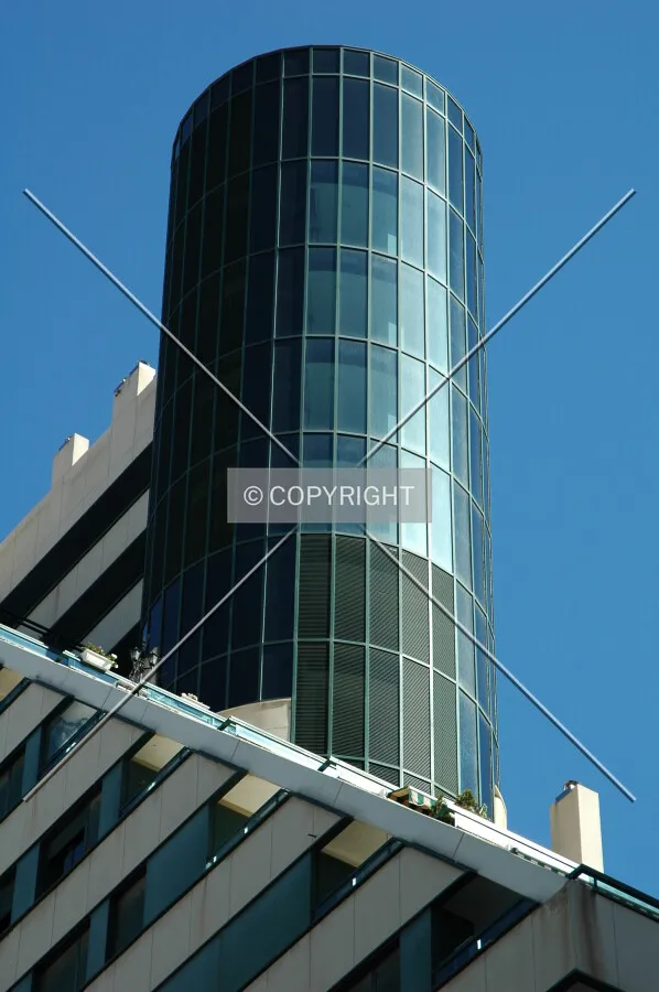 Glass facade for stairs and elevators core