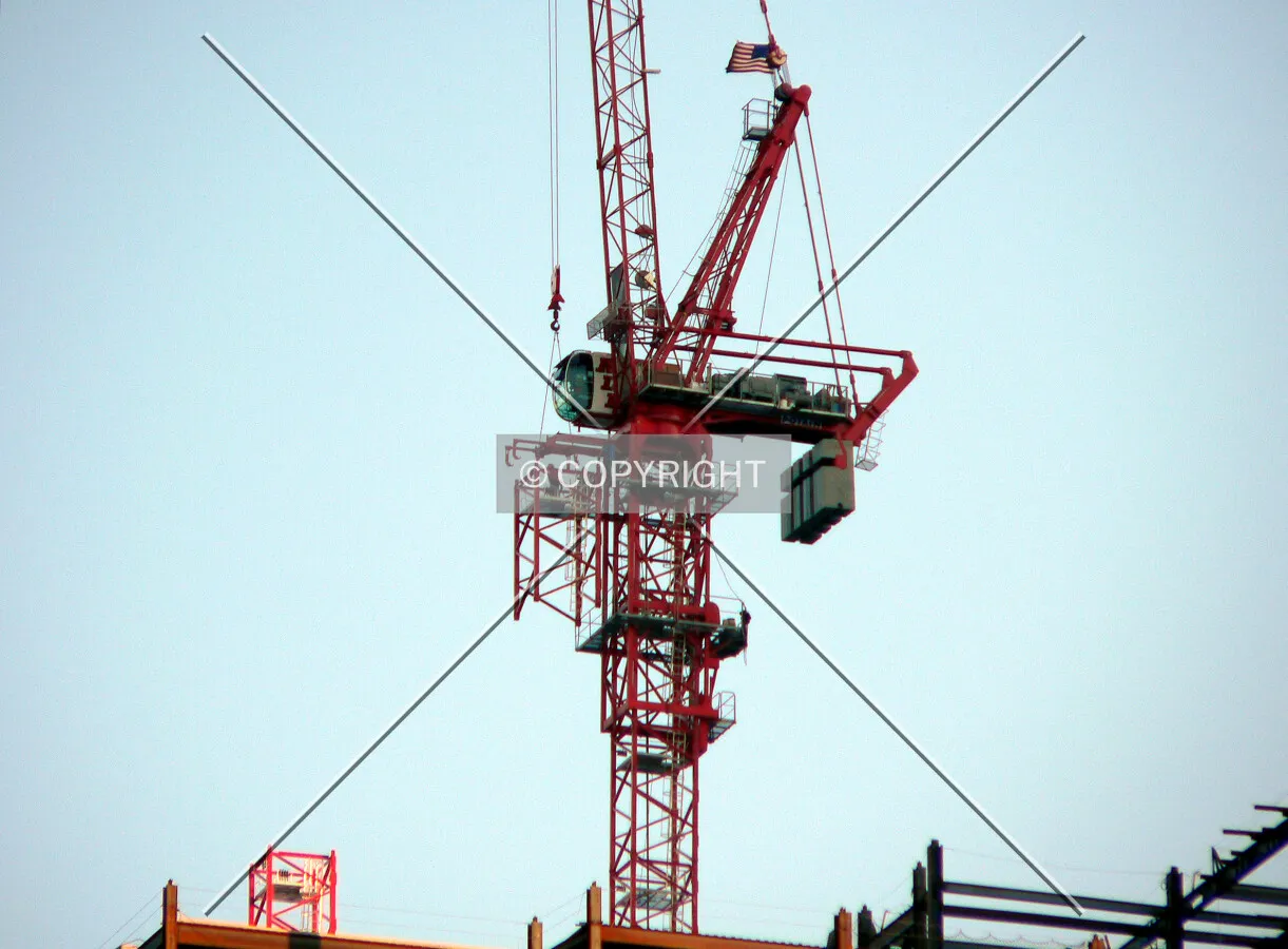 Adding a section of tower to the crane