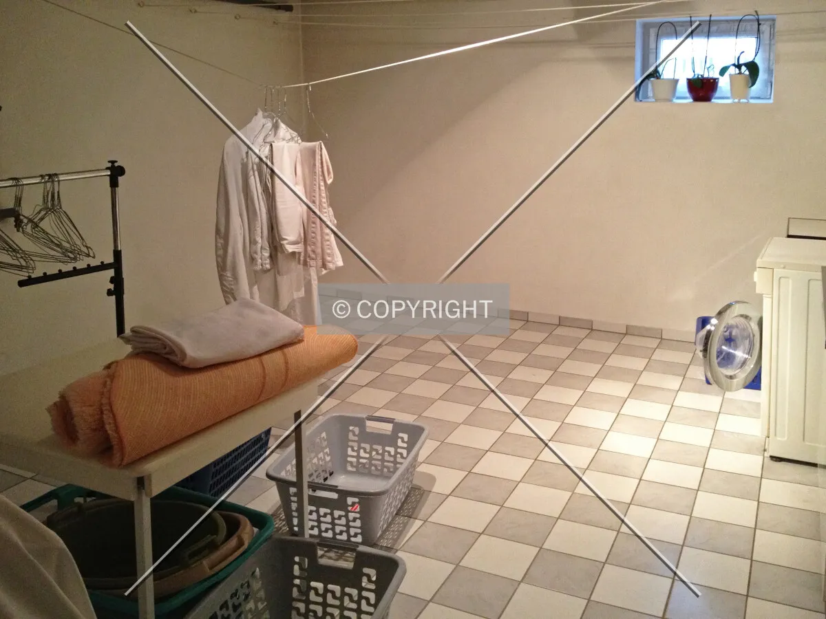 A private laundry room in a house