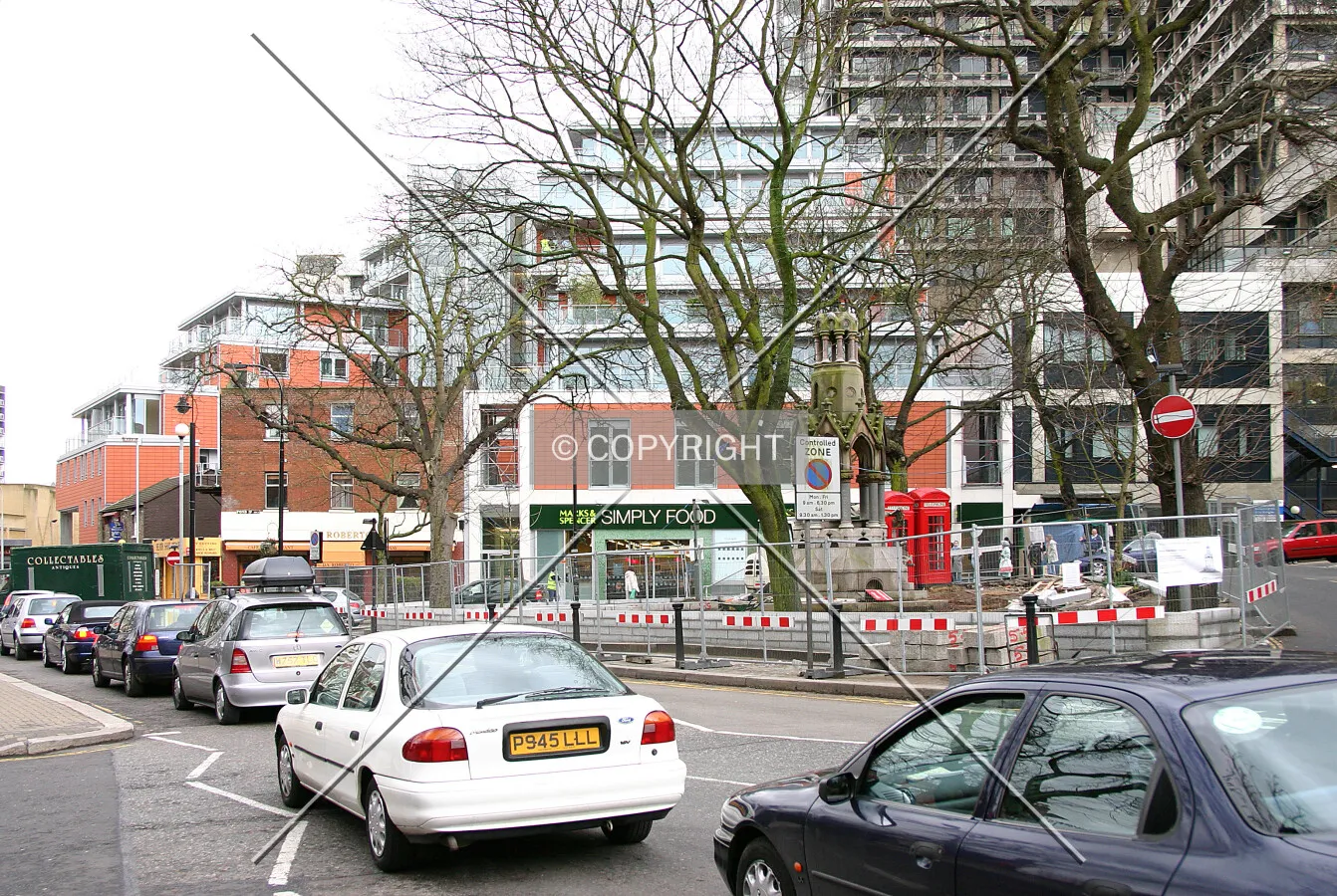 View southwest through the trees of South End Green