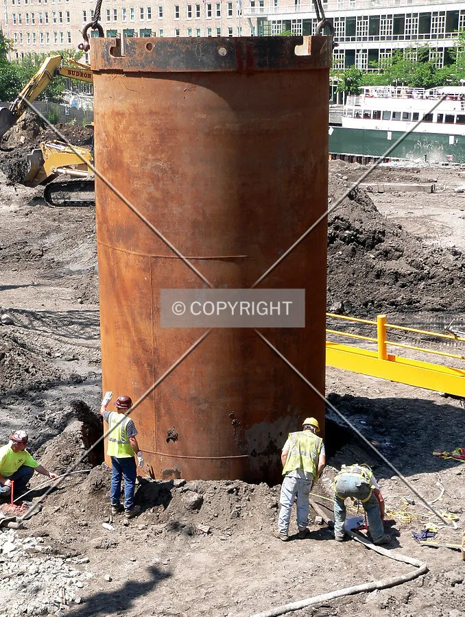 Making sure the recently installed caisson liner is aligned properly