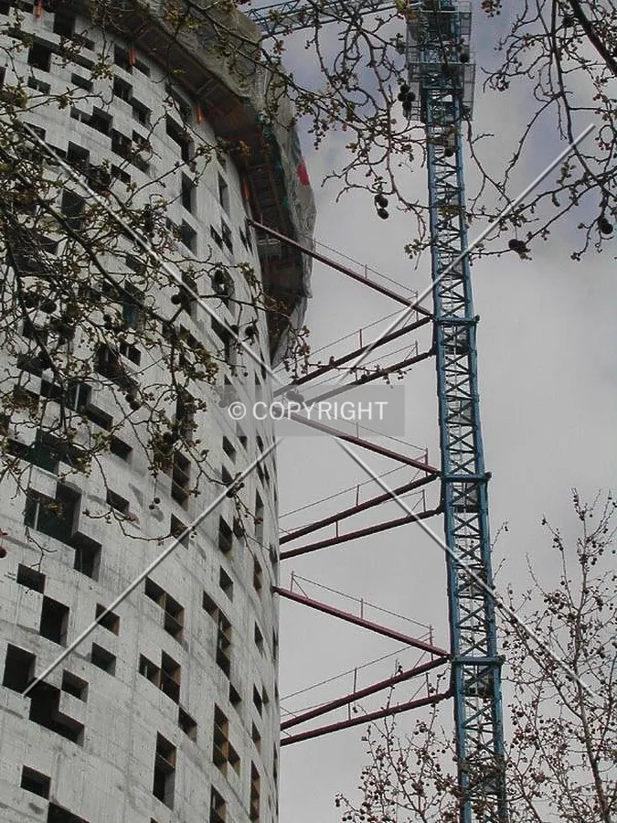 View of the tower's connections with one of the cranes on March 25