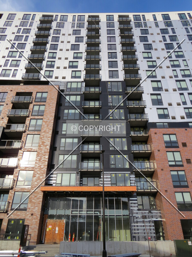 Looking up from across Portland Avenue