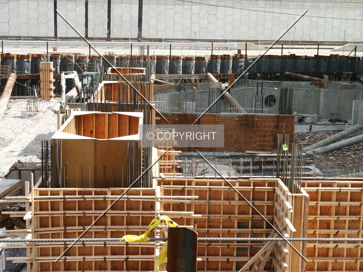Foundations with the Lake Shore Drive barrier wall in the background