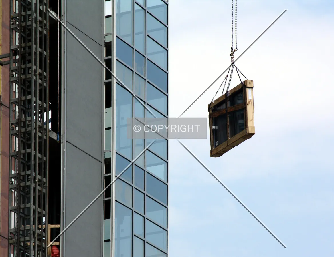 Glass panes being lifted on the northern side