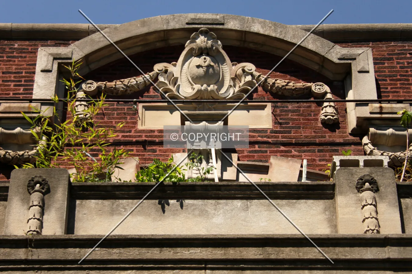 Ornament at the top center of the front facade
