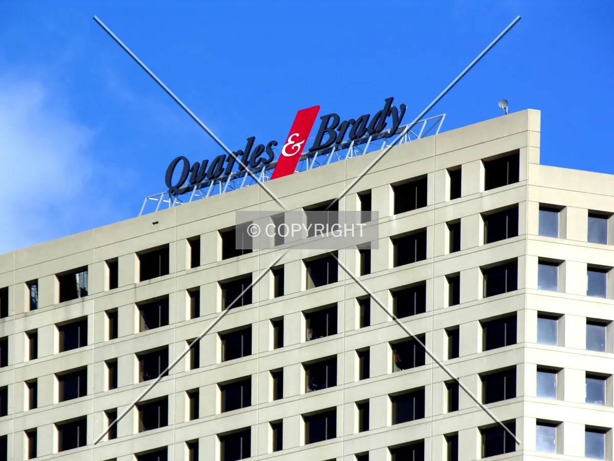 Upper floors and signage on the southern side