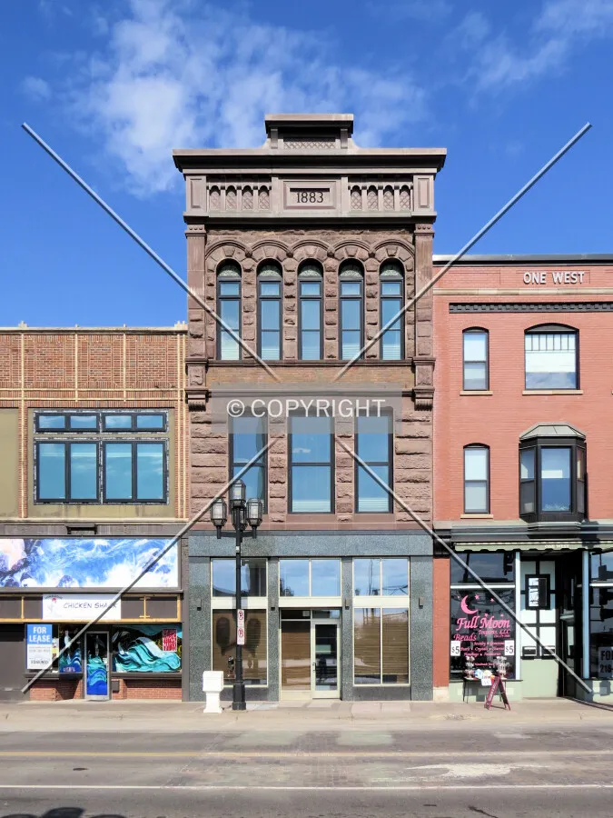 Full front elevation from across Superior Street