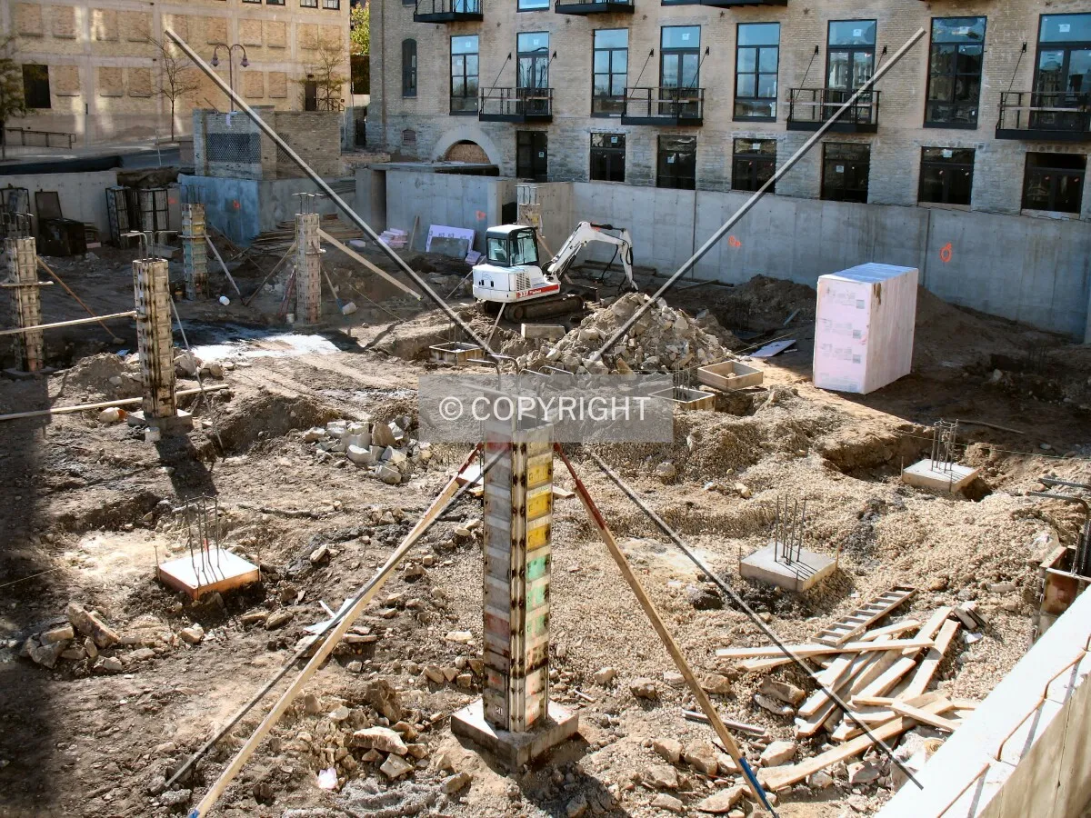 Foundation work on the north side, from West River Parkway