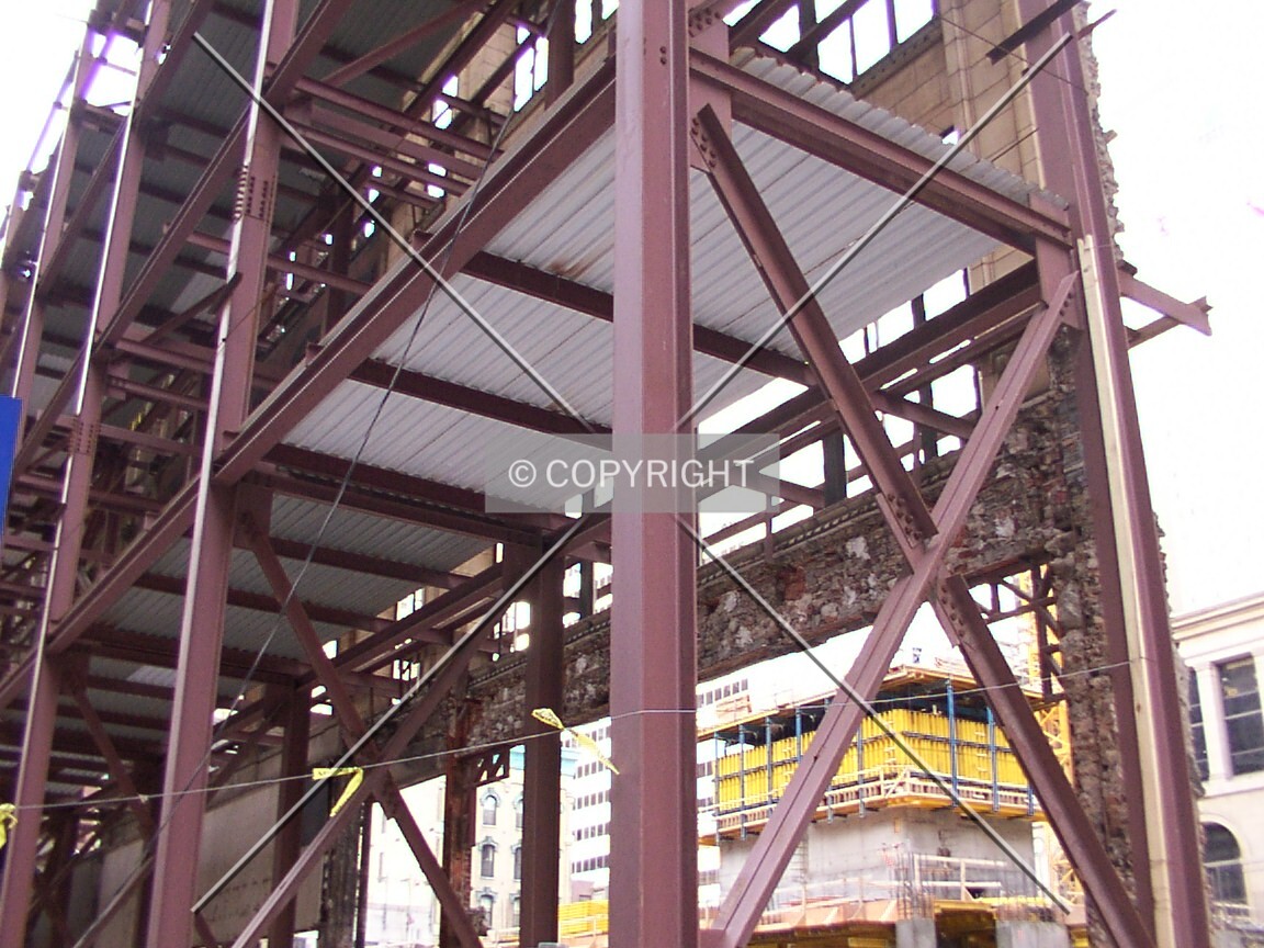 Scaffold holding up the old facades