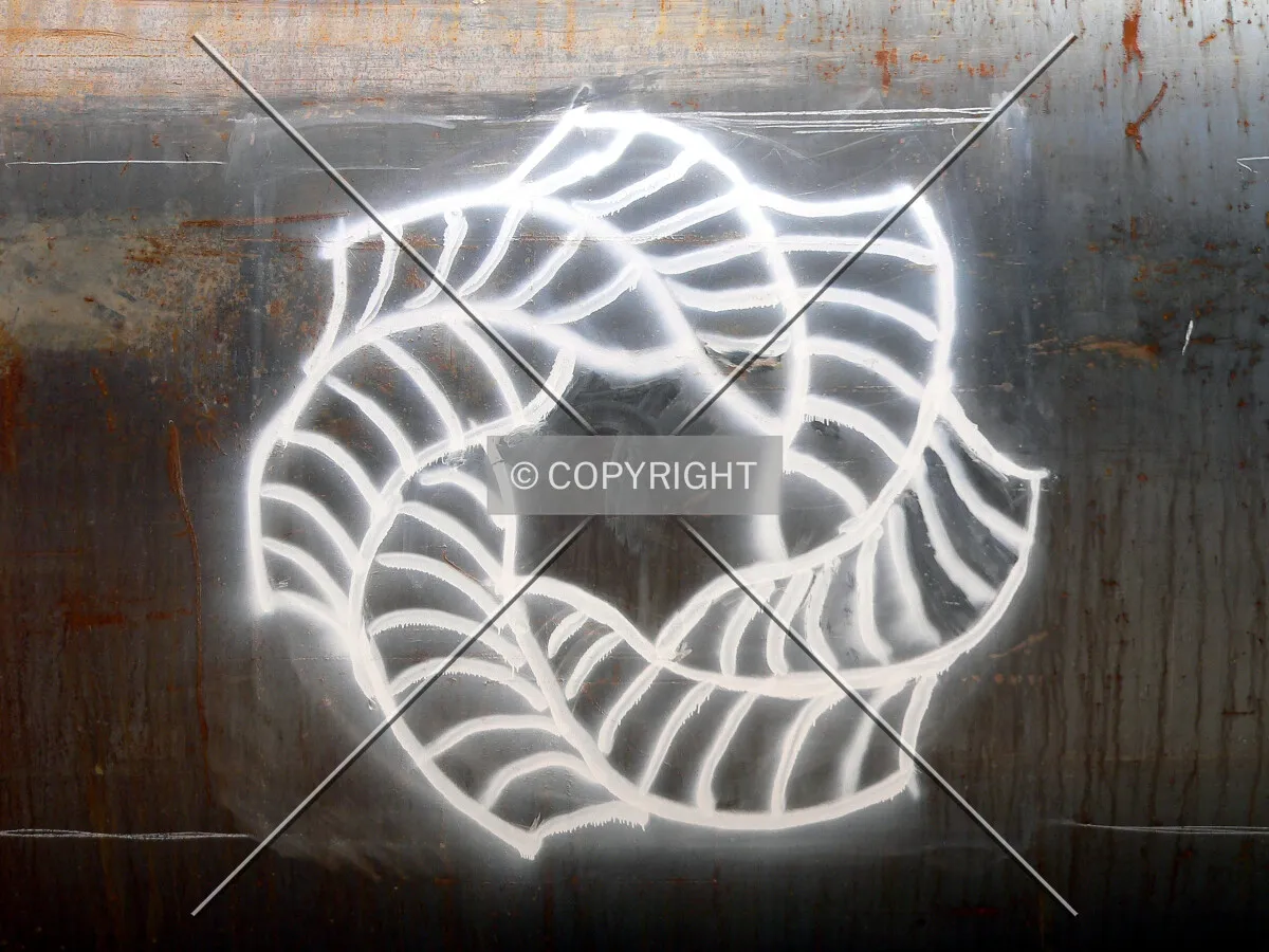 Symbol spray painted on a caisson rock can