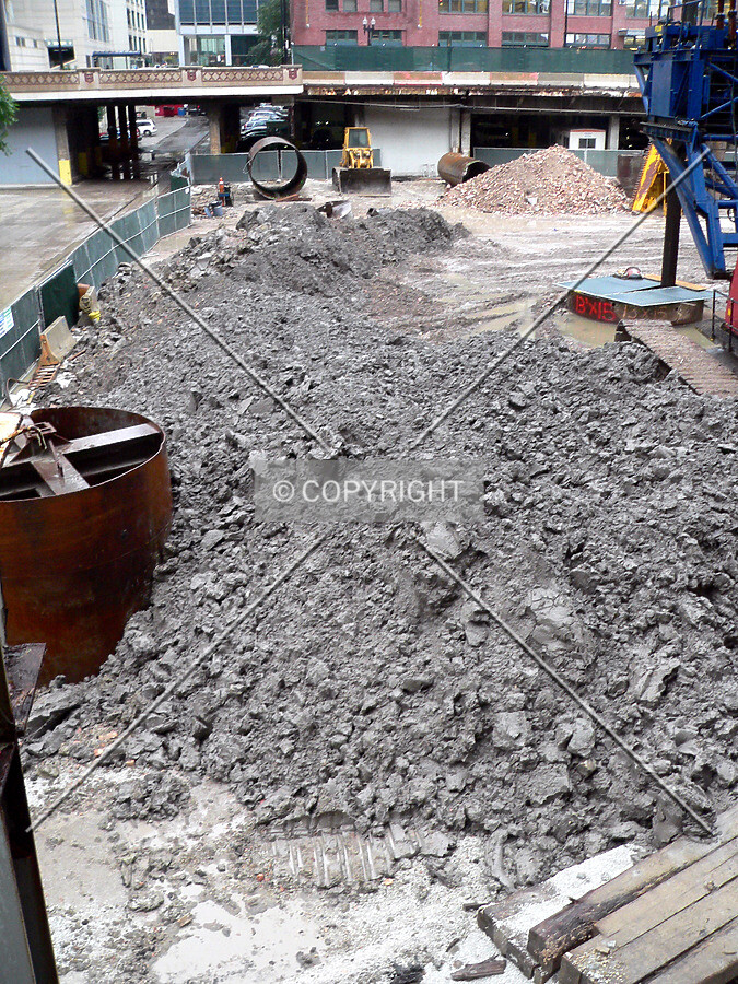 A mound of clay excavated by the drilling of caisson holes