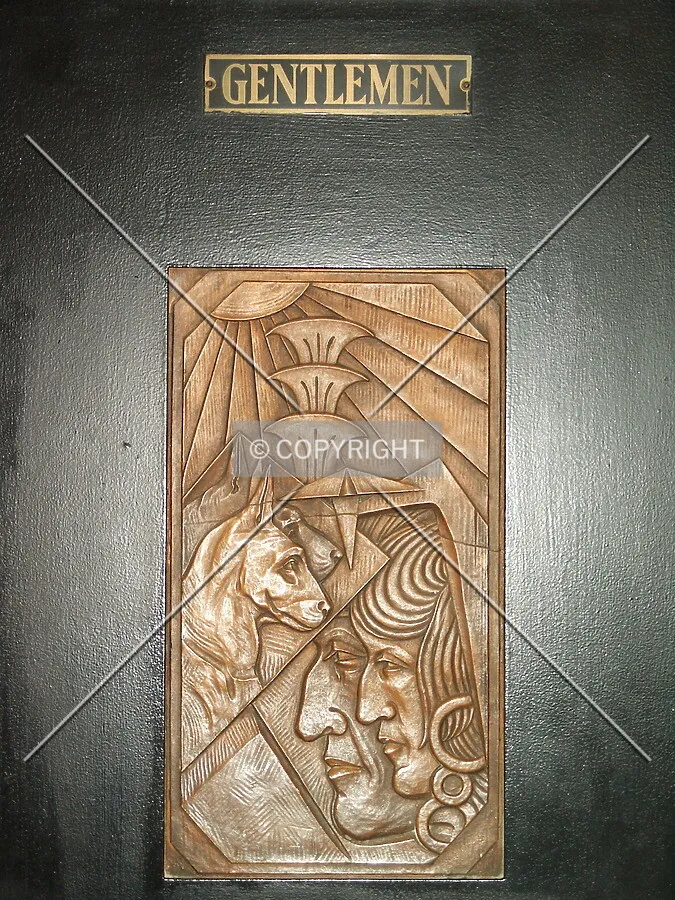 Men's room sign by the ballroom