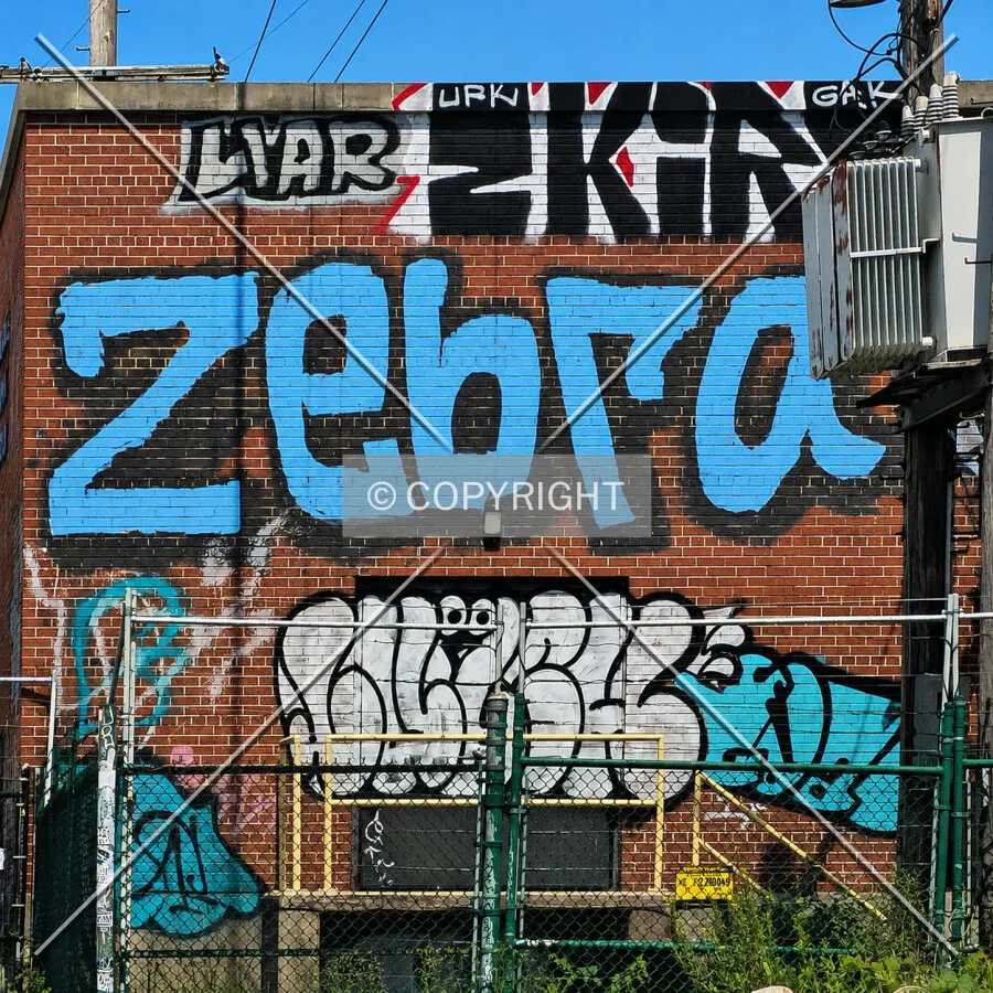 Graffiti on the south facade, Sunday, August 16, 2026
