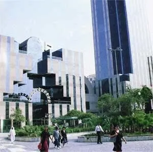 Between the commerical center and the tower