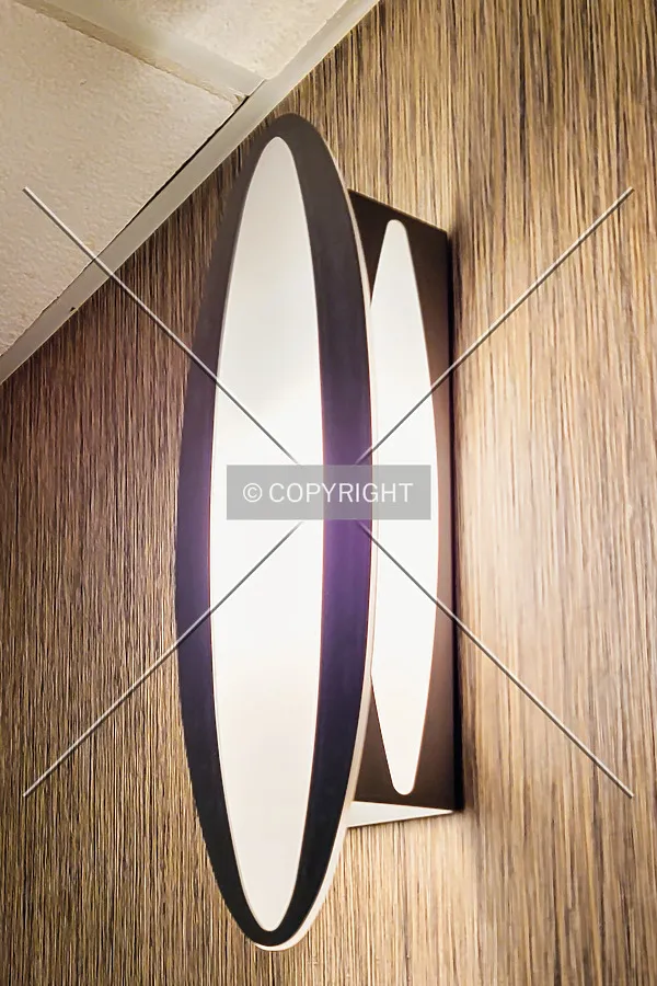 A light fixture in the fourth floor hallway; November 10, 2021