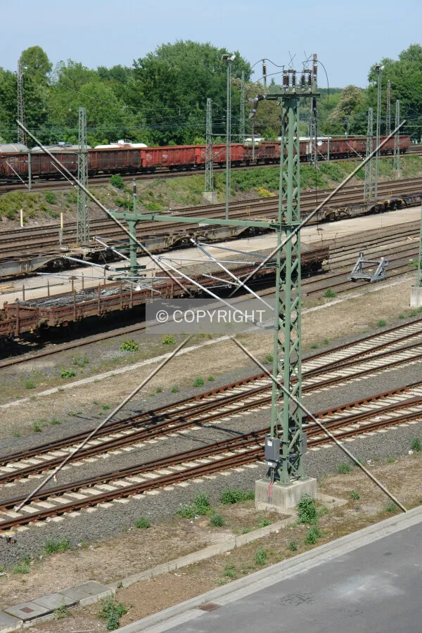 A power pole for trains on a railyard