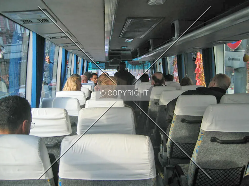 People riding a bus in China