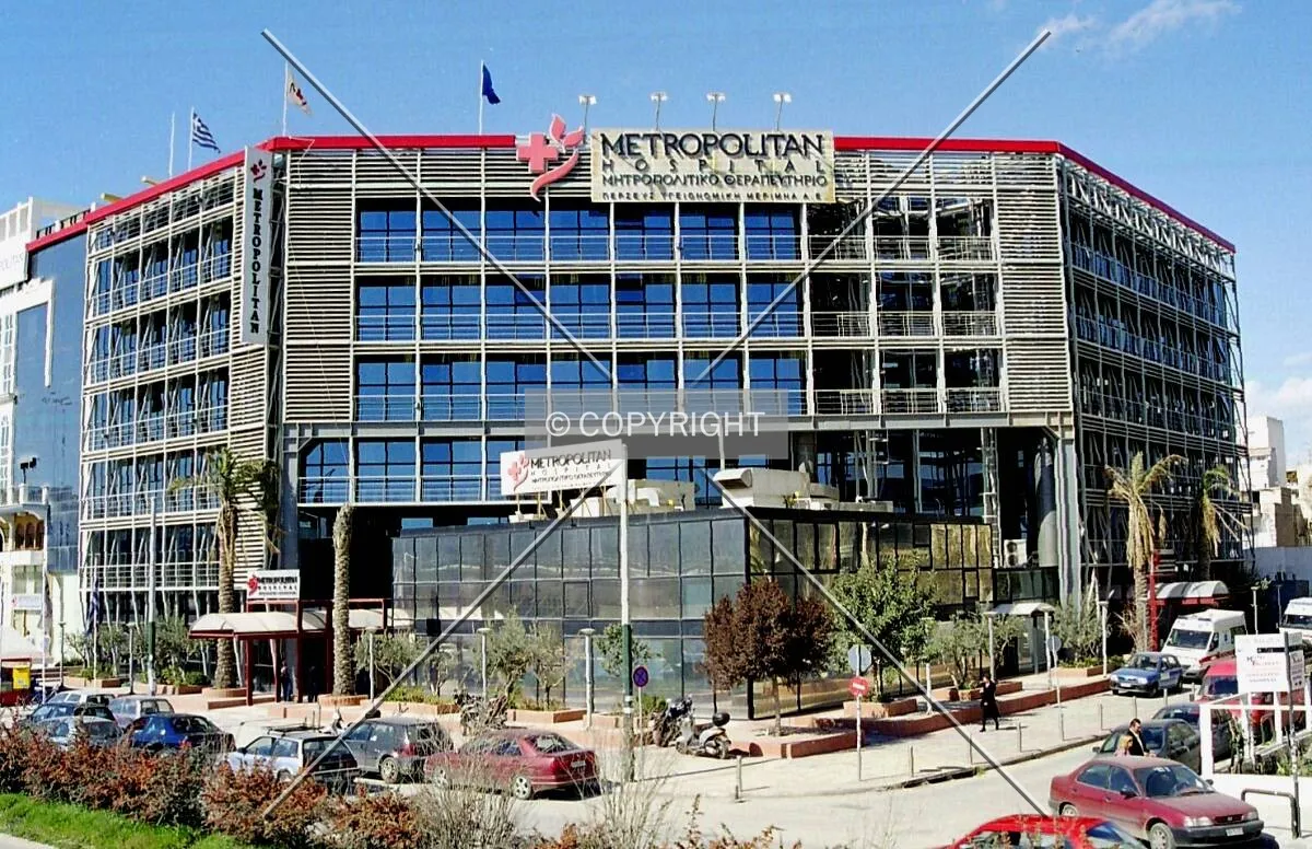 View of the front (east) side of the hospital as seen from the tram railway bridge across Ethnarchou Makariou Avenue