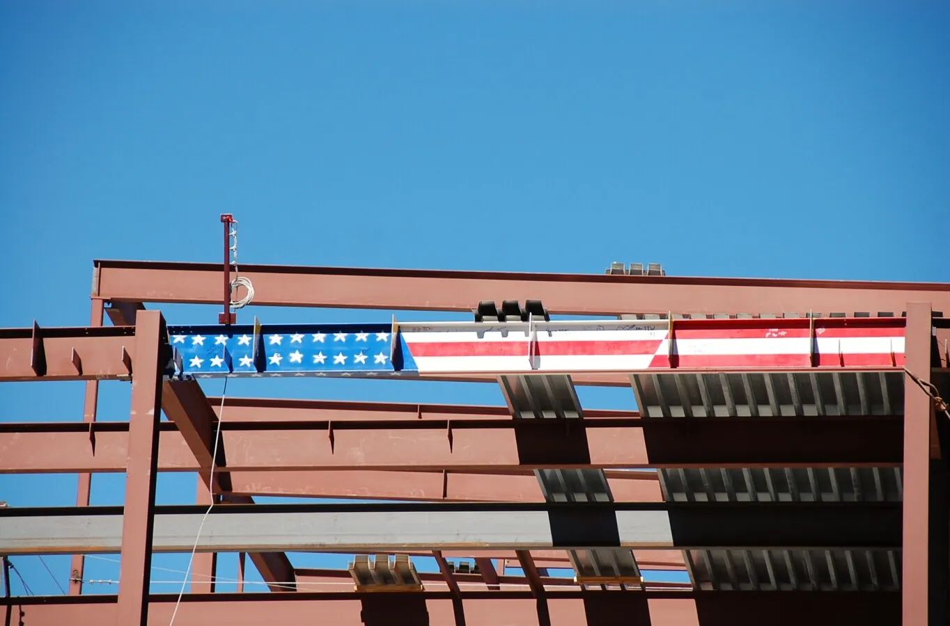 The final beam in place
