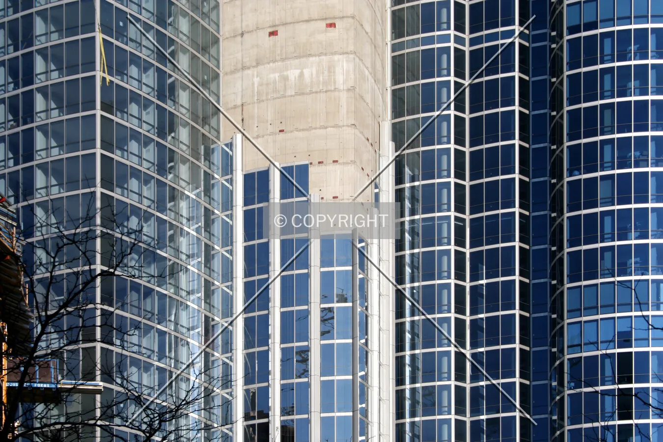 Curtain wall panels rising up the concrete core