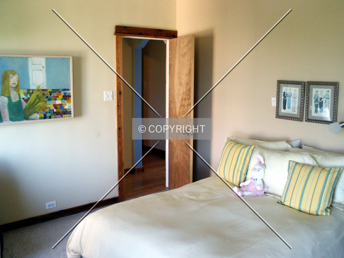 A bedroom in one of the units with the Aurora floor plan