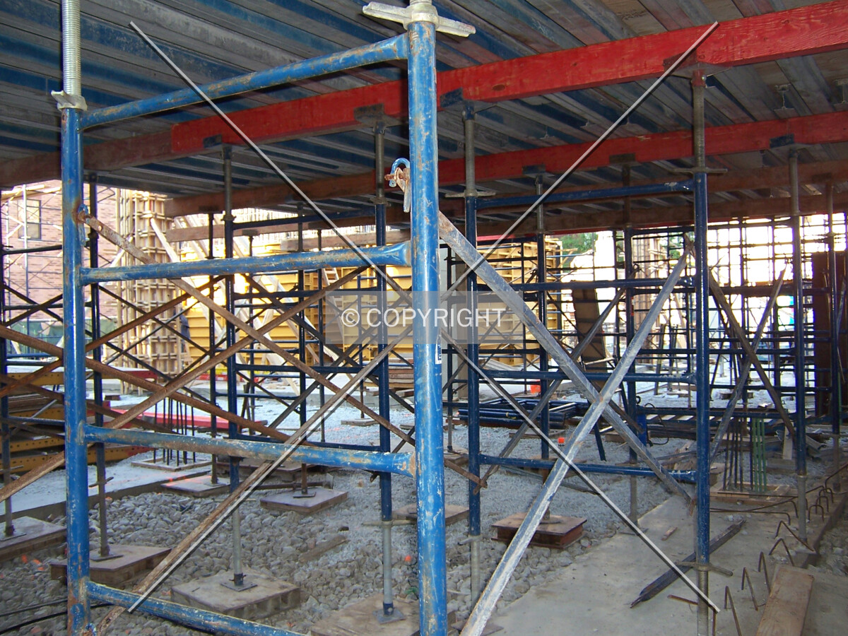 Scaffolding holding up the concrete forms for the parking garage ramp in the southwest corner of the site