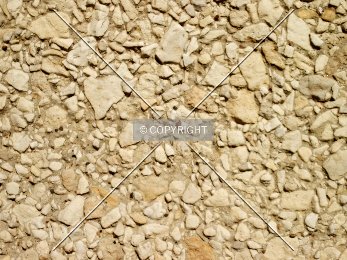 Close-up of the rocky concrete surface on the lower columns