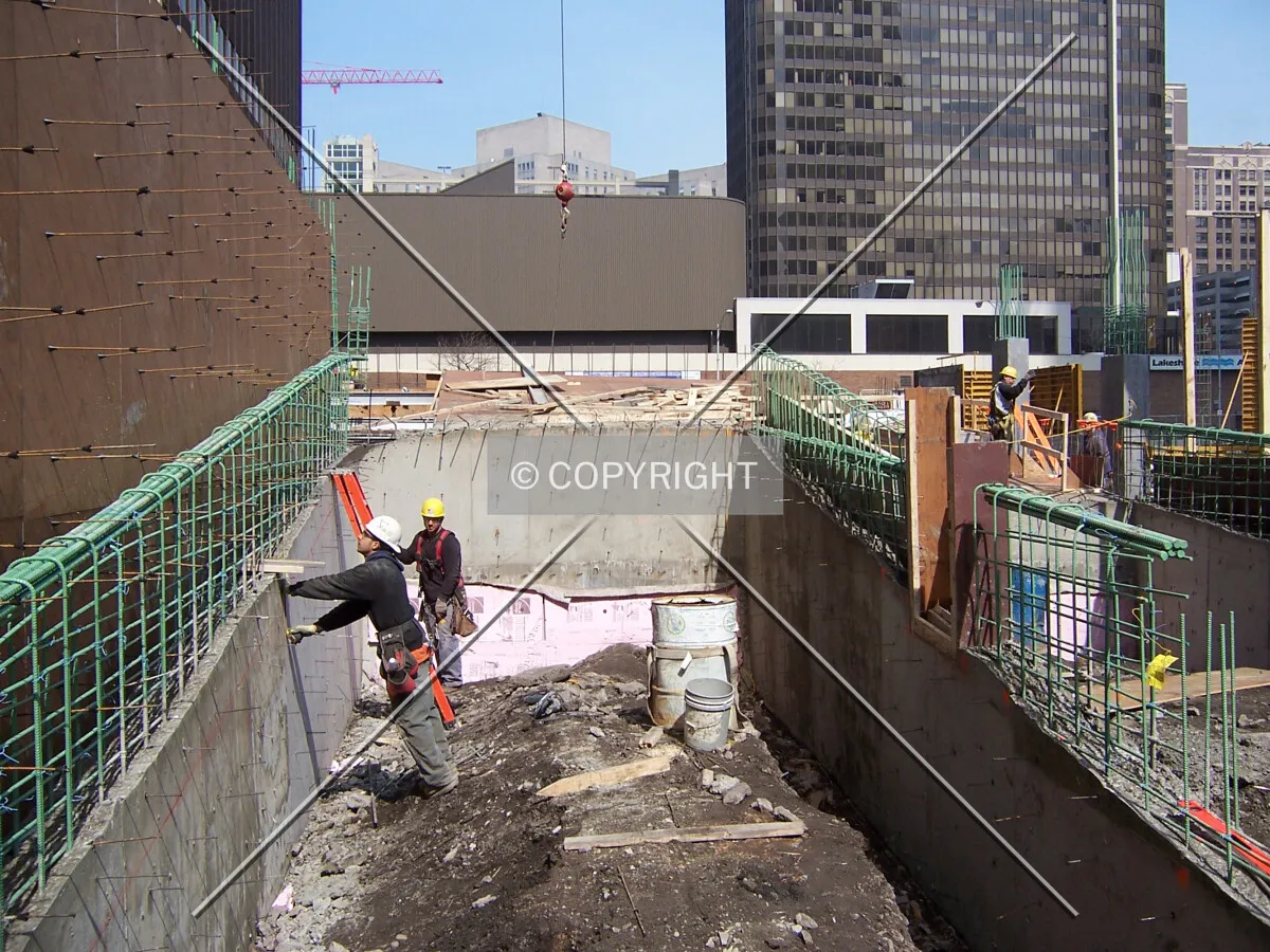 Looking north into the site from Illinois Street. This will be the ramp of the parking garage