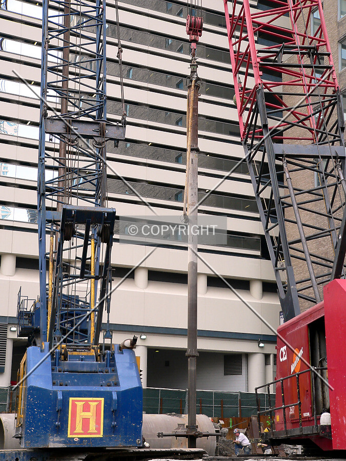 Raising drilling equipment out of a caisson hole