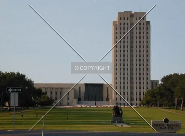 The asymmetrical capitol building as viewed from the grounds