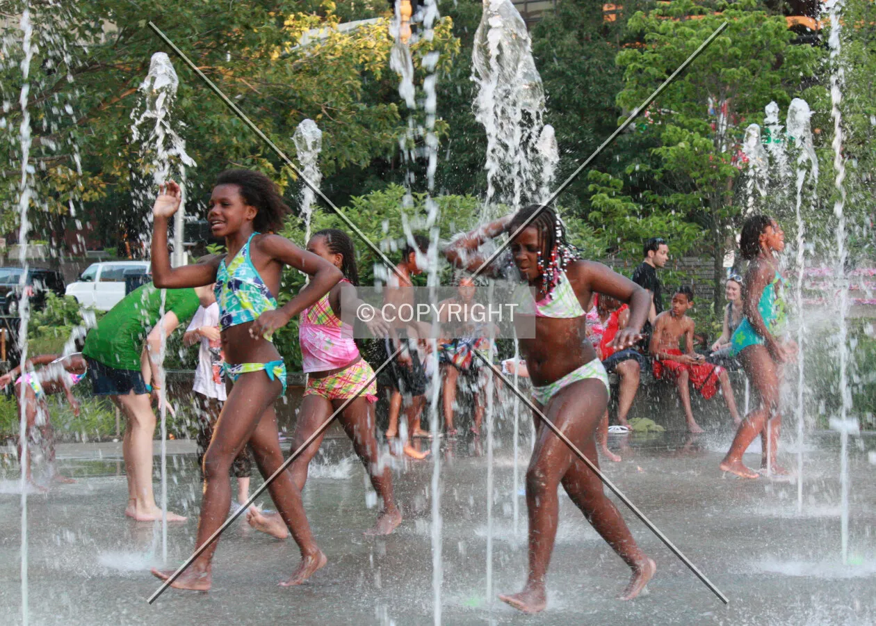 Children playing in the fountains