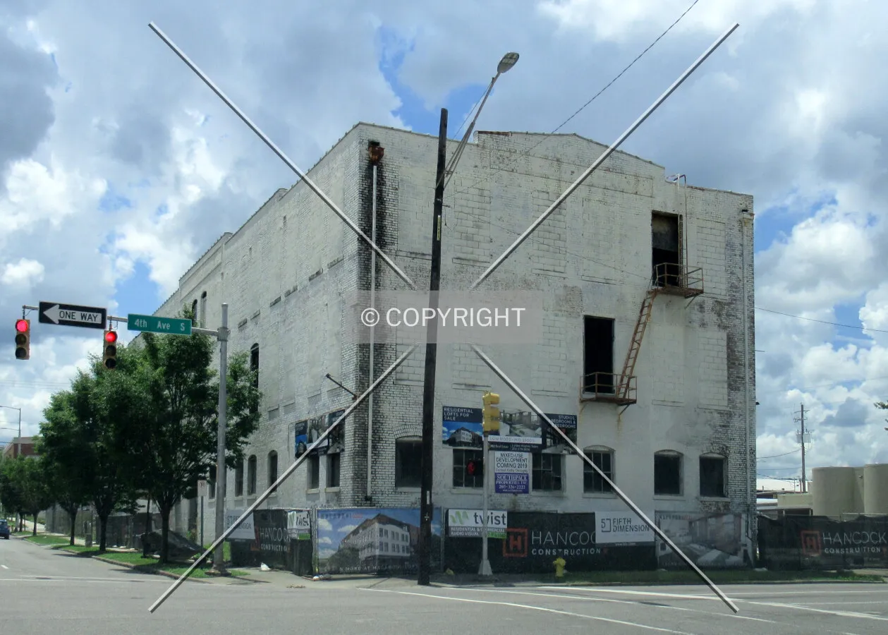 From the north prior to the addition of the fourth floor as part of its conversion