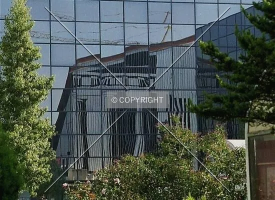 View of the reflections on the glass facade of the building