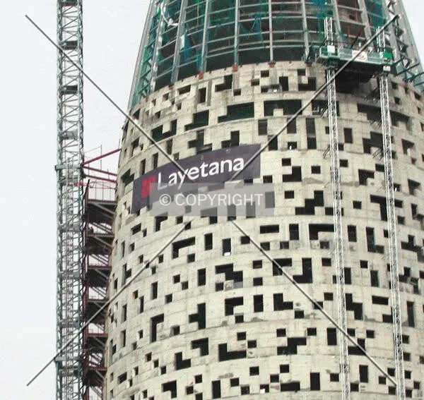 View of the concrete facade, the elevators and the beginning of the steel dome