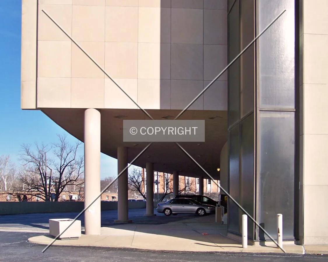 Covered parking in the rear of the building