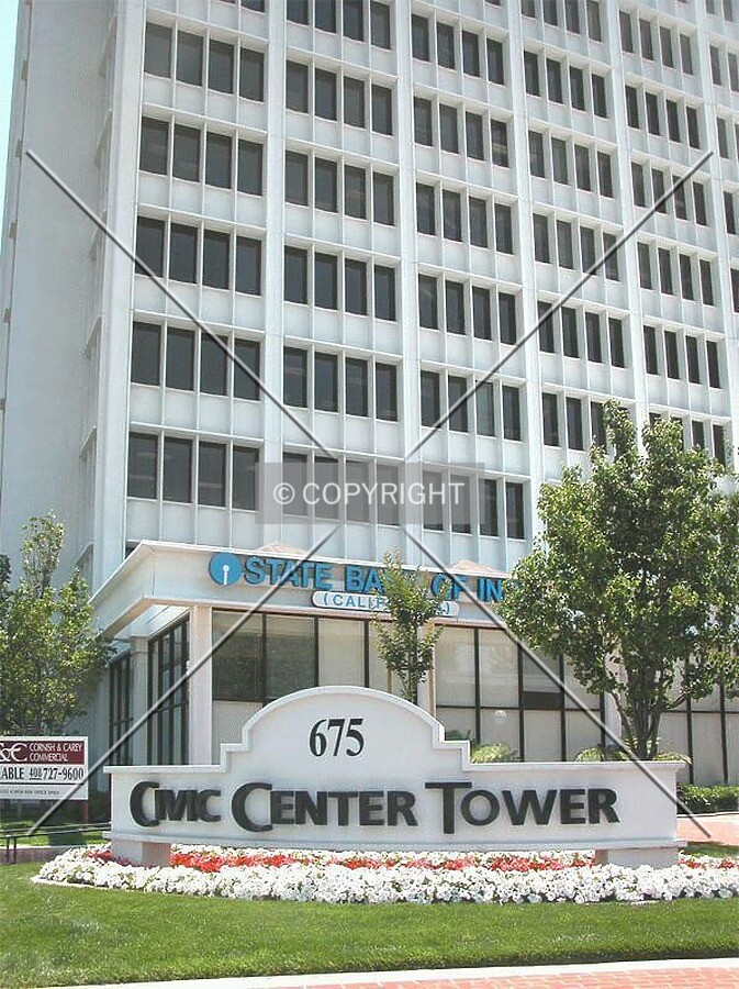 Sign and front entry along First Street