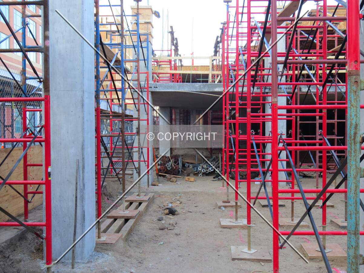 Scaffolding, first floor columns, and second floor slab