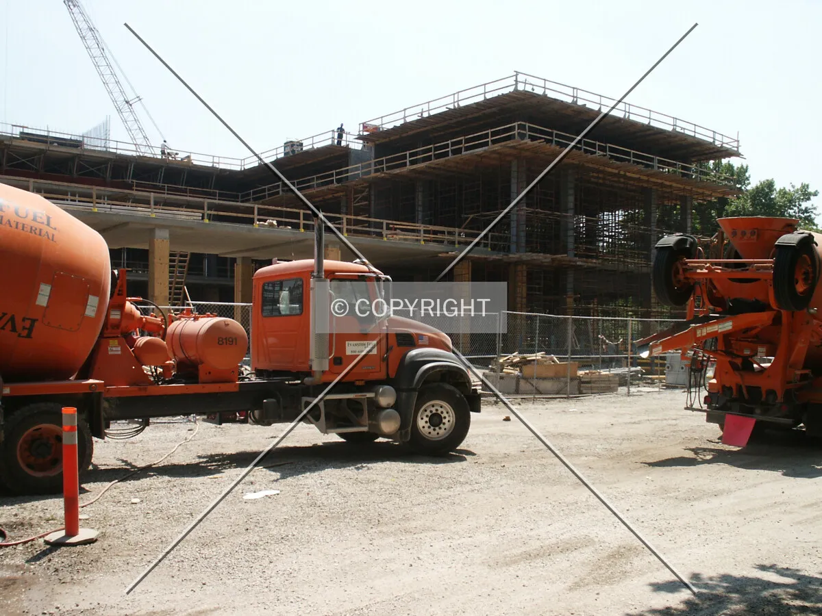View from the west with concrete trucks