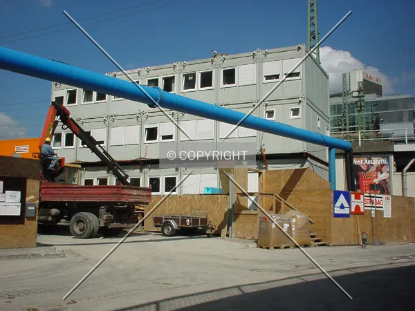 Containers next to the site entrance