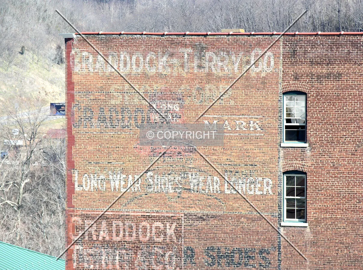 Faded former signage on the western side