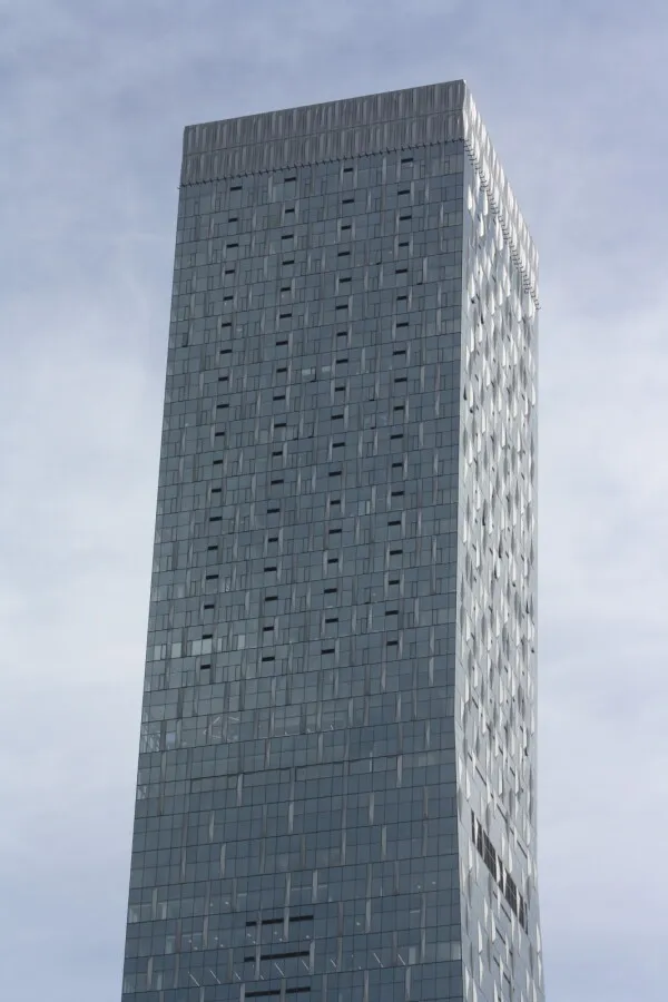 The top of the Rainier Square Tower as seen from First Ave. and University St.