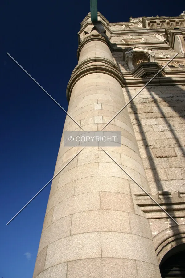 Looking all the way up the south tower's west pillar, showing the variation in stonework textures and details