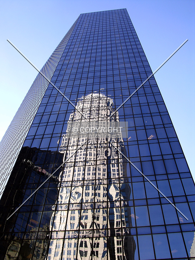 Looking up the north side with the Bank of America Corporate Center in the reflection