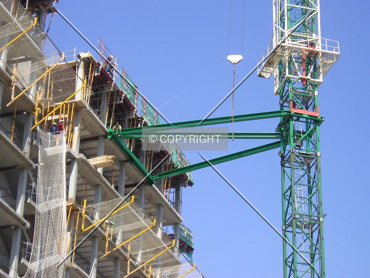 View of the construction crane attached to the building, as they prepare to extend it