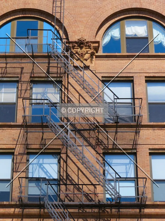 Fire escape and facade detail facing North Broadway