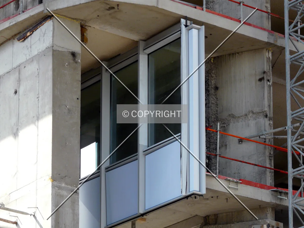 First glass panels put up on the lower floors